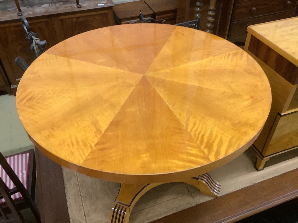 A Biedermier style birch and part ebonised circular coffee table, 85cm diameter, height 56cm